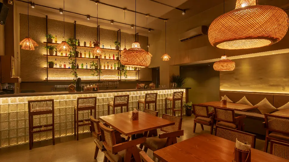 brown wooden furniture in a cafe - made using Canadian wood that sources its building materials and products through responsible forestry set to showcase at leading furniture exhibition indiawood 2024